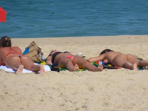ladies laying out side boob